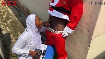 A Festive Christmas Encounter With A Sexy Woman In Hijab And Santa